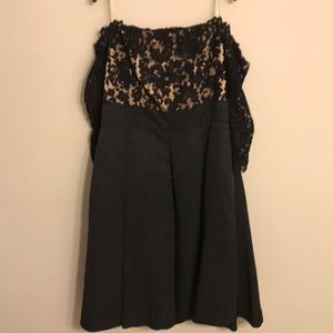 Strapless black dress, lace top and empire waist.